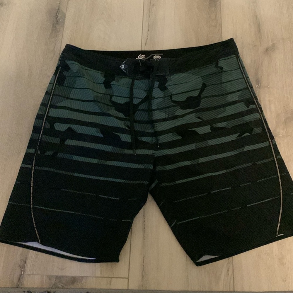 Men’s Mayhem board shorts, size 38